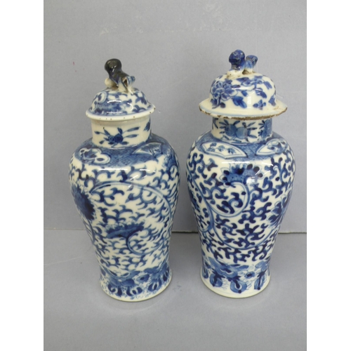 19 - Pair of 19thC Chinese blue and white porcelain urns with decoration of flora, fauna and insects. Fou... 