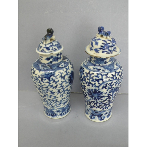 19 - Pair of 19thC Chinese blue and white porcelain urns with decoration of flora, fauna and insects. Fou... 