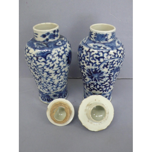 19 - Pair of 19thC Chinese blue and white porcelain urns with decoration of flora, fauna and insects. Fou... 