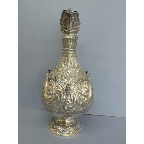 2 - Late Victorian chased silver claret jug with fir cone finial and decoration of angels and lion mask ... 