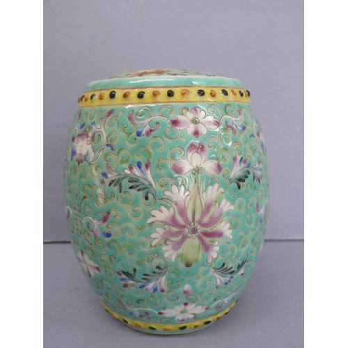 20 - Guangxu barrel shaped porcelain jar with cover (broken) having floral and feather decoration in mult... 