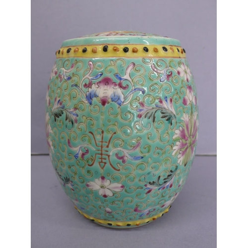 20 - Guangxu barrel shaped porcelain jar with cover (broken) having floral and feather decoration in mult... 