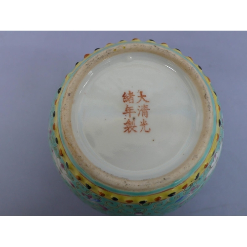 20 - Guangxu barrel shaped porcelain jar with cover (broken) having floral and feather decoration in mult... 