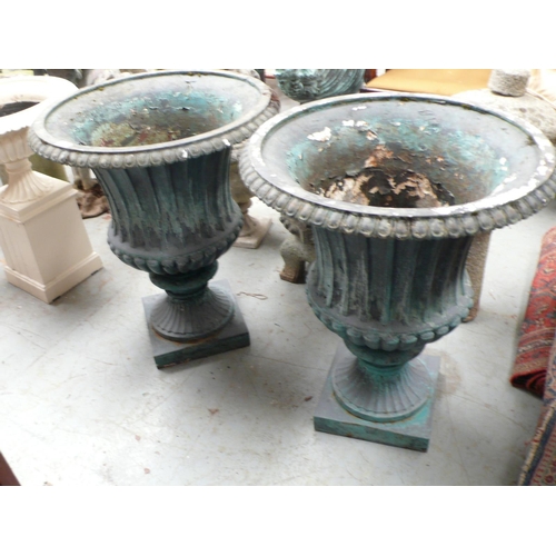 208 - A large pair of painted cast iron fluted garden urns - height 30 ins approx