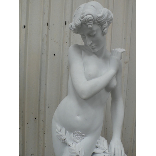 211 - A white Carrara marble statue of a nude woman  - height 58 ins approx