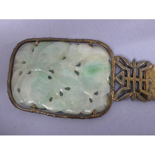 22 - 19th/20thC Chinese gilt metal letter opener with pale green carved pierced jade panel to top, showin... 