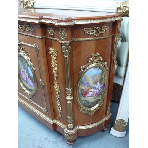 223 - A French quarter veneered gilt metal mounted walnut break fronted demilune side cabinet with oval pa... 