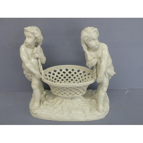 23 - Meissen style white glazed porcelain chestnut or fruit basket with putti to each side, underglaze bl... 