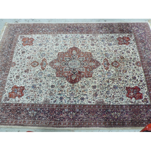 234 - Fine hand woven Persian carpet with eight borders, central medallion, floral decoration in mainly re... 