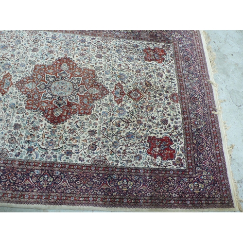 234 - Fine hand woven Persian carpet with eight borders, central medallion, floral decoration in mainly re... 