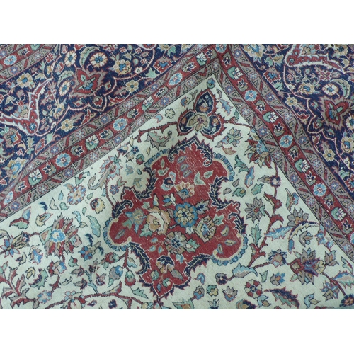 234 - Fine hand woven Persian carpet with eight borders, central medallion, floral decoration in mainly re... 