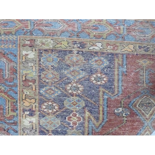 237 - A Middle Eastern handmade wool carpet with Geometric designs in multicoloured wools, 49x77ins