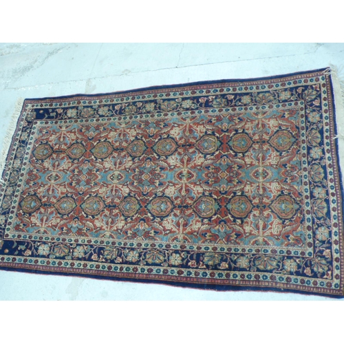 238 - Middle Eastern handmade wool carpet with floral designs in multicoloured wools, 49x91ins