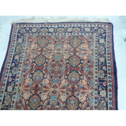 238 - Middle Eastern handmade wool carpet with floral designs in multicoloured wools, 49x91ins