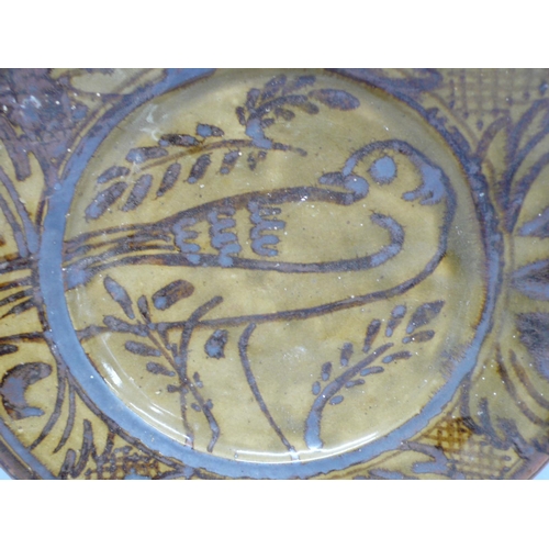 254 - Probably by Alan Caiger-Smith, Studio pottery stoneware dish with decoration of bird in brown tin gl... 