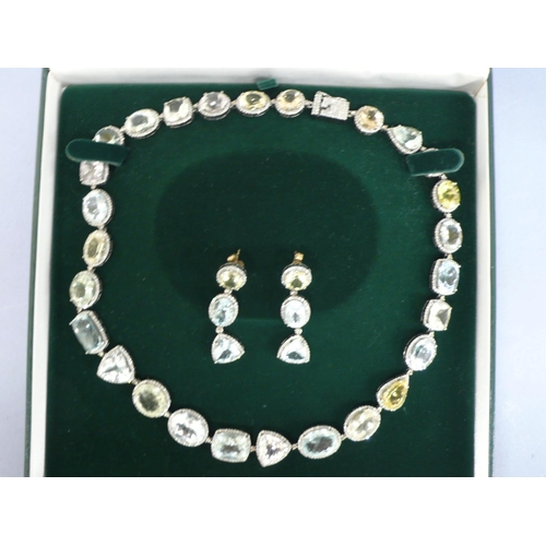 255 - Aquamarine, morganite, heliodor and green beryl large cut stone necklace surrounded by diamonds set ... 