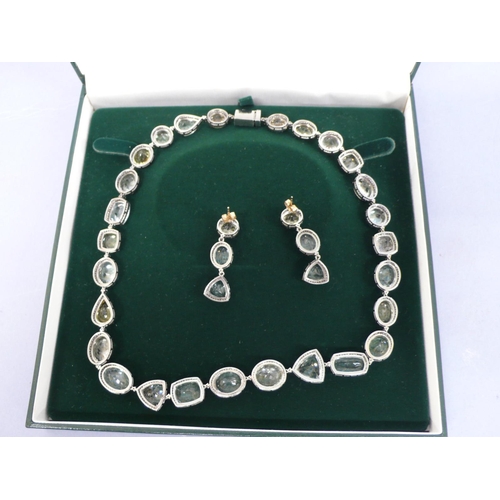 255 - Aquamarine, morganite, heliodor and green beryl large cut stone necklace surrounded by diamonds set ... 