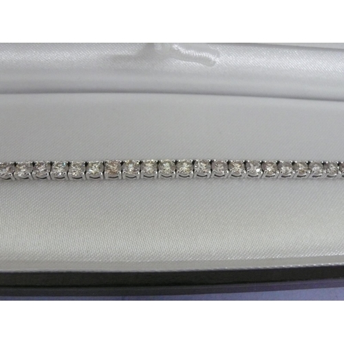 256 - 18ct white gold round brilliant cut bracelet, diamonds approx 7cts