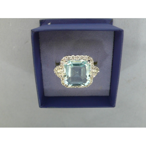 258 - 18ct white gold ring with large octagonal aquamarine surrounded by diamonds, aquamarine 8.6cts, with... 