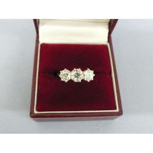 28 - Good three stone diamond ring set in platinum, approx 2cts diamonds, size O/P