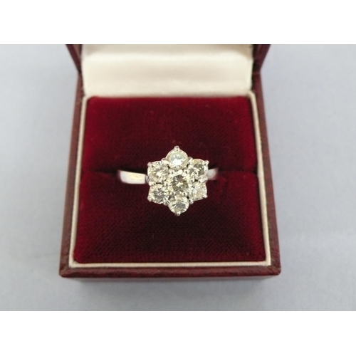 29 - 18ct white gold flower shaped diamond cluster ring, size V