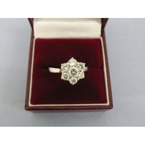 29 - 18ct white gold flower shaped diamond cluster ring, size V