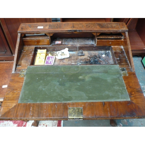 51 - A walnut bureau in the Georgian style with fall front, single drawer, cabriole legs and pad feet - w... 