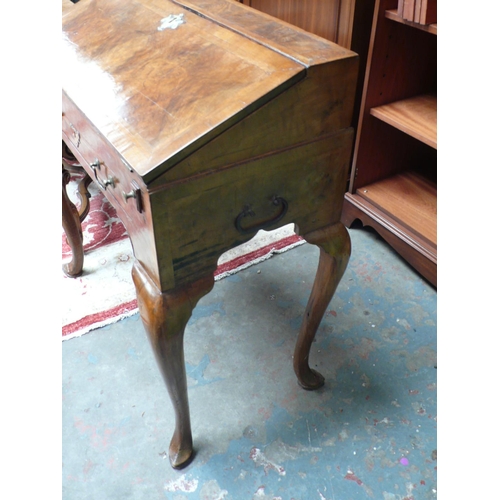 51 - A walnut bureau in the Georgian style with fall front, single drawer, cabriole legs and pad feet - w... 