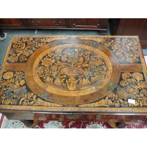 54 - An 18thC Dutch marquetry table with single drawer having decoration of birds, flowers, vases in box ... 