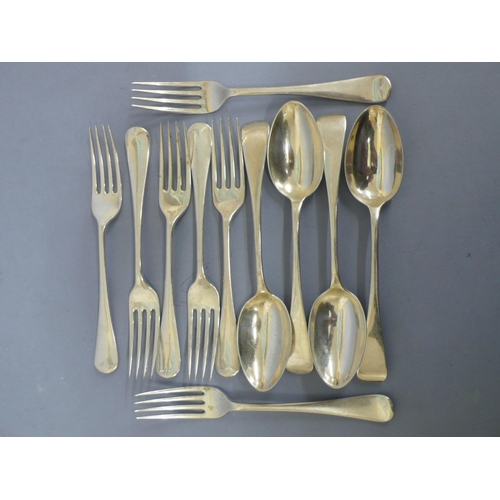 287 - Seven silver pudding forks and four spoons, Sheffield 1897, 1912 & 1925, 18 ozt.