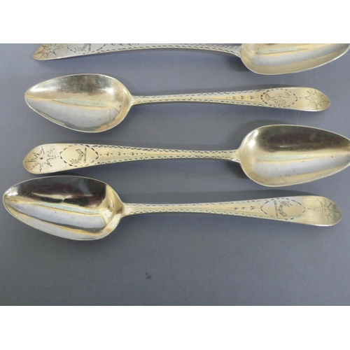 288 - Six Irish GIII and later silver pudding spoons and a serving spoon Dublin 1789, 95, 98, 1803 & 1903,... 