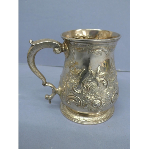 291 - GIII chased silver half pint baluster shaped tankard with scroll handle, London 1760, 6 ozt, Maker S... 