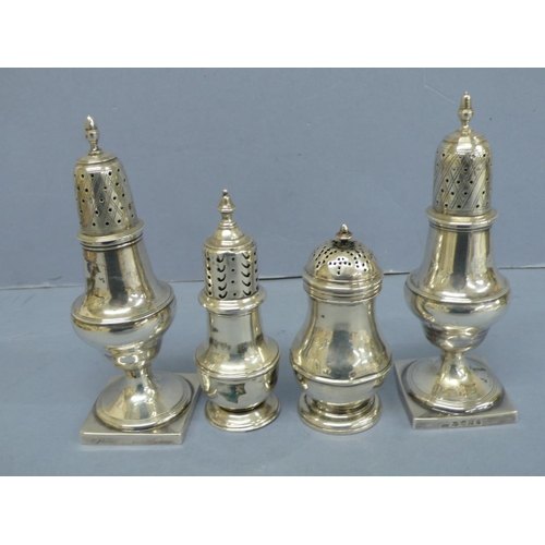 293 - Four silver pepper pots of baluster form London 1721, 1796, 1810 & 189, 11 ozt., various makers