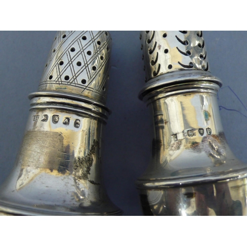 293 - Four silver pepper pots of baluster form London 1721, 1796, 1810 & 189, 11 ozt., various makers