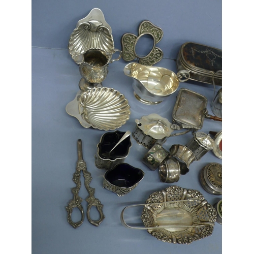 296 - A collection of Georgian and later silver dining table and dressing table items, weighable 34.5 ozt.