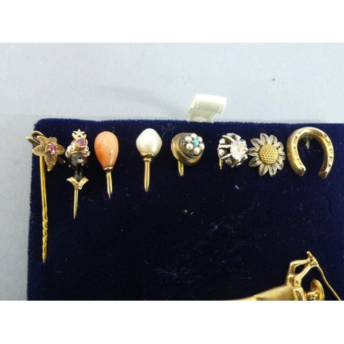 299 - Eight stick pins and two brooches 18, 15 & 9 ct. gold - ruby, diamond, pearl, coral, enamel, silver ... 