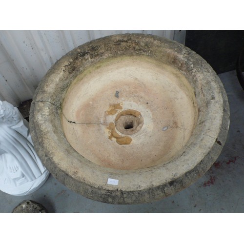 213 - A large carved stone campana urn - diameter 35 ins approx  height 36 ins approx (cracked)