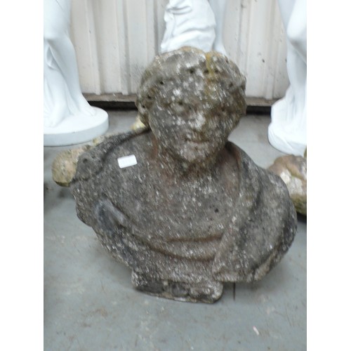 217 - An antique carved and stone head and shoulders of a Roman Emperor - height 22.5 ins approx