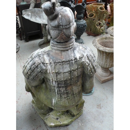 218 - A terracotta statue of a samurai warrior knealing - height 45 ins approx