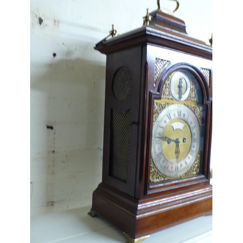 313 - 19thC mahogany bracket clock with carrying handle, silvered chapter rings, ormolu spandrels on brass... 