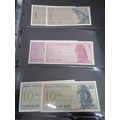 A folder of worldwide bank notes