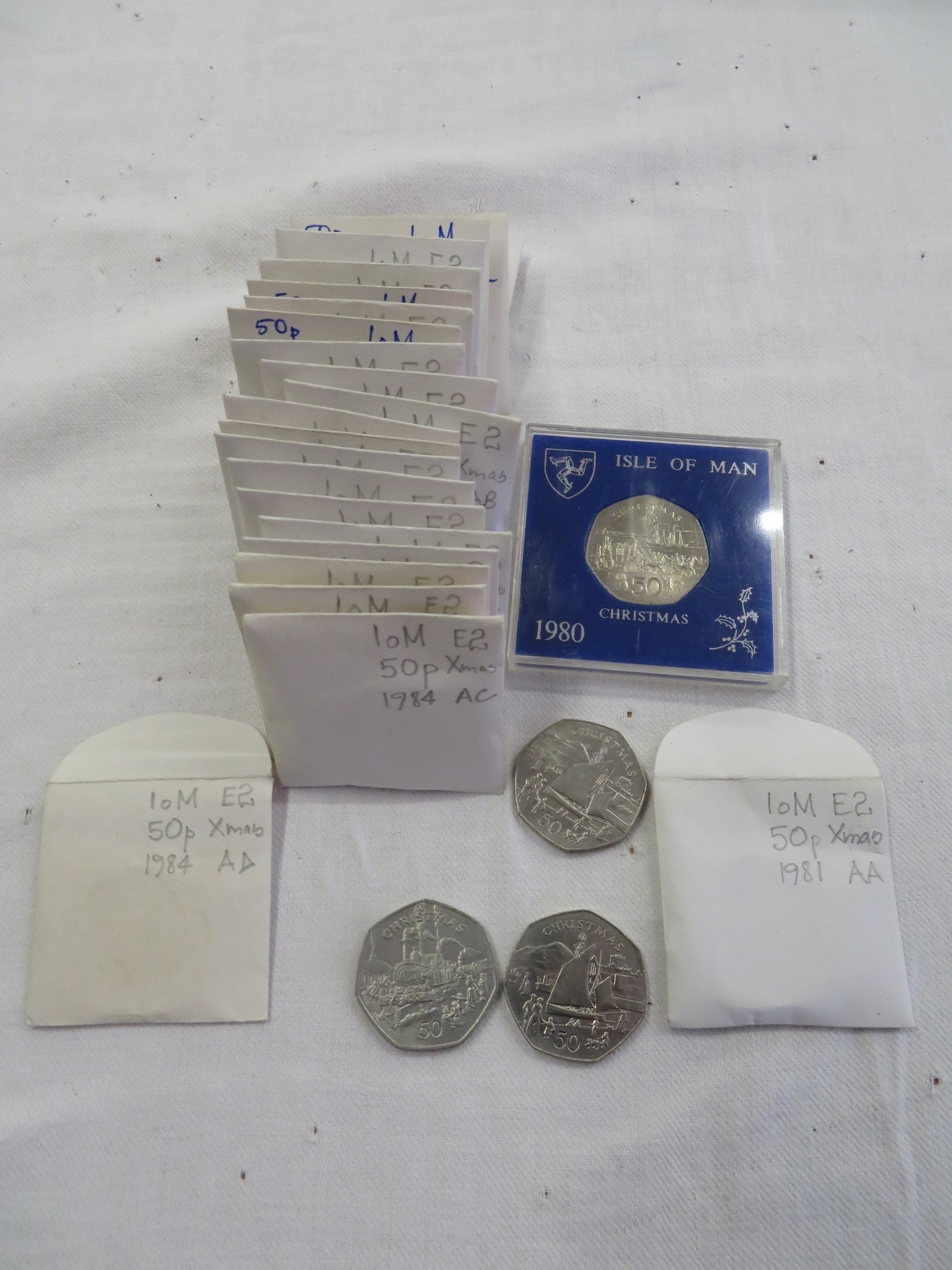 Thirty-Eight Isle of Man 50 pence coins, Christmas 1980-1984