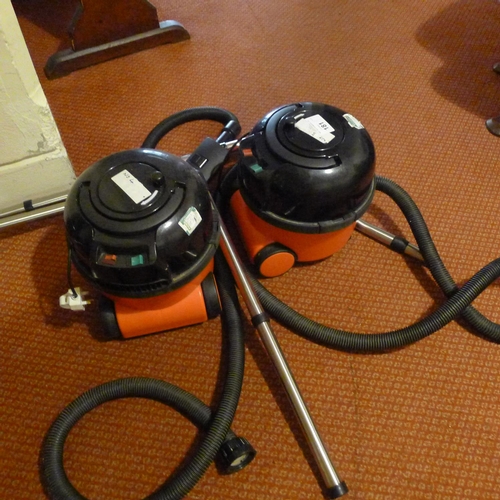 181 - Two Henry pull along vacuum cleaners (located in room 51)