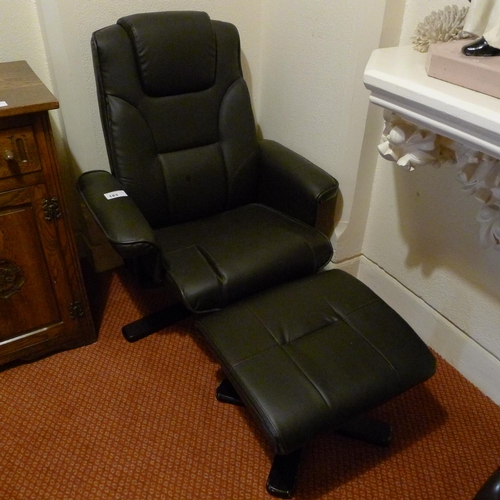 183 - A black leather look contemporary design armchair with matching footstool (located in room 51)