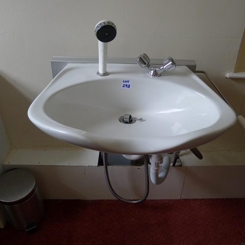 298 - a manual rise & fall Hairdressers sink with shower attachment, item is located in room 13 & will req... 