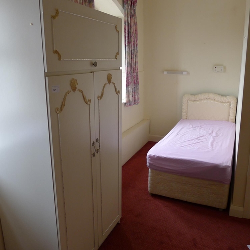 32 - A quantity of miscellaneous general bedroom furniture including; a wardrobe, two single beds, chest ... 