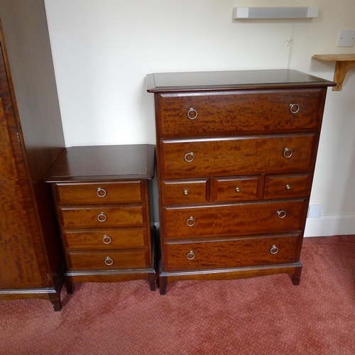 75 - A dark wood 3 piece bedroom suite comprising; a wardrobe and two chests of drawers and a single bed ... 