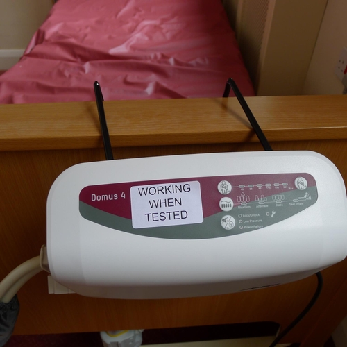 88 - A modern electrically operated rise and fall patient's bed with An Apex inflatable mattress with ele... 