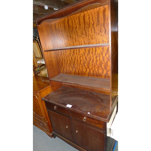 124 - A reproduction dark wood bookcase cabinet with 2 open shelves 2 drawers and 2 doors below