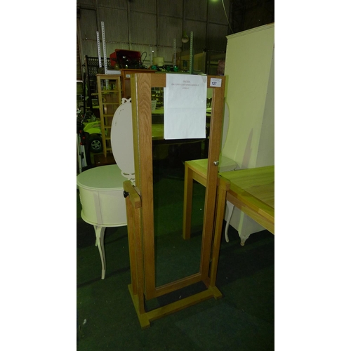 127 - 1 full length mirror in oak tipping frame - the mirror door opens to reveal shelves inside